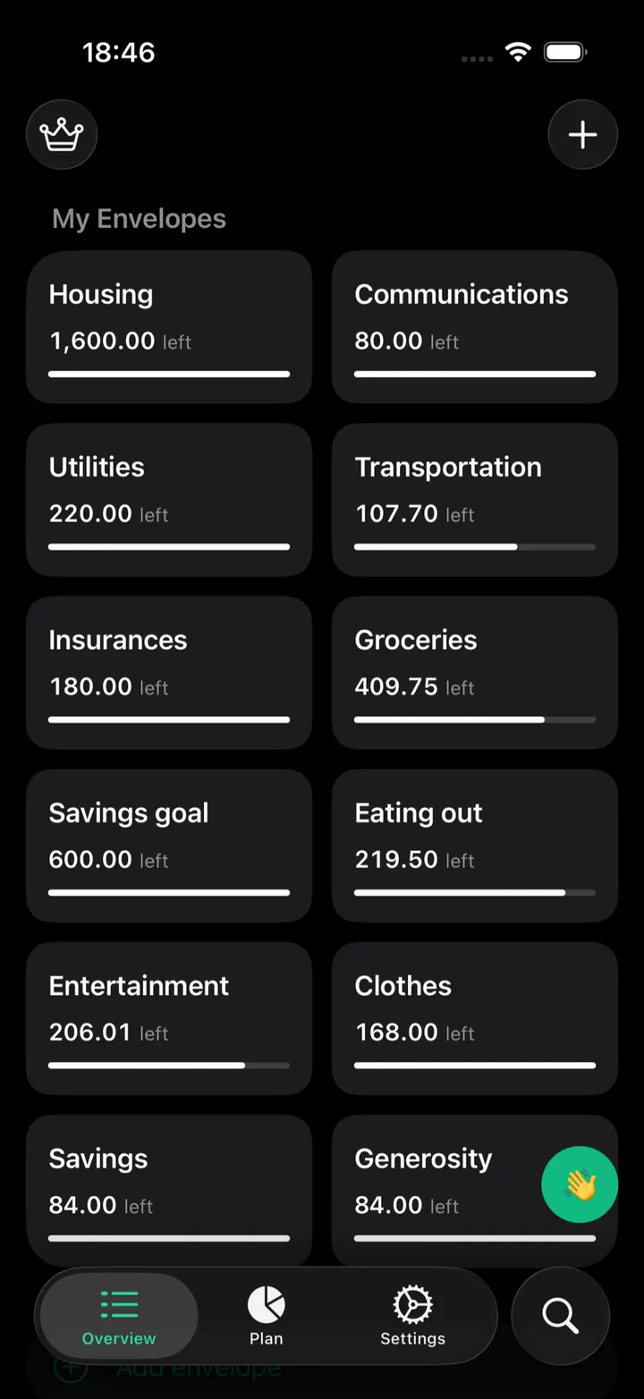 The Envelopes overview screen in dark mode showing a monthly budget split across envelopes like Housing, Groceries, and Eating out, each with its remaining balance